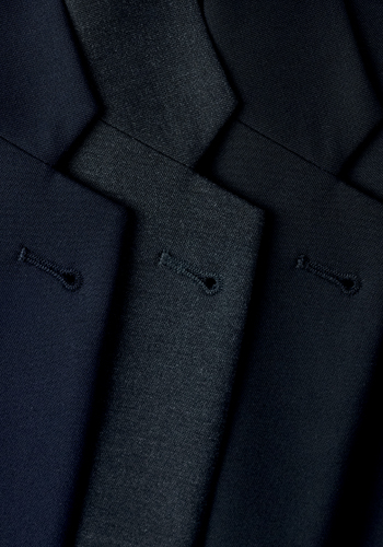 Detail of elegant jackets for men in three colours